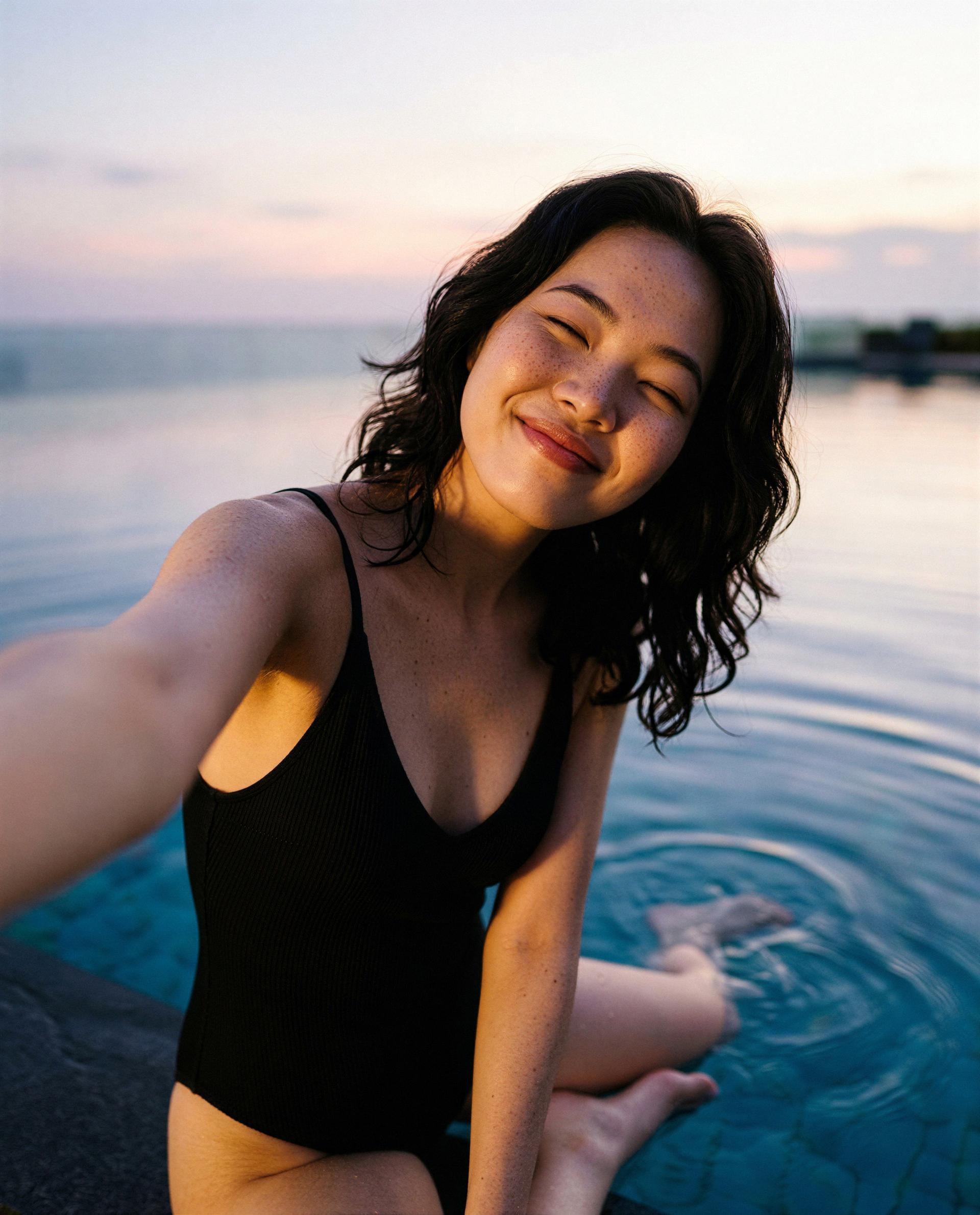 Golden hour, warm water, and a swimsuit with your name on it - care to claim it? 😘, by Ga-eun Bae
