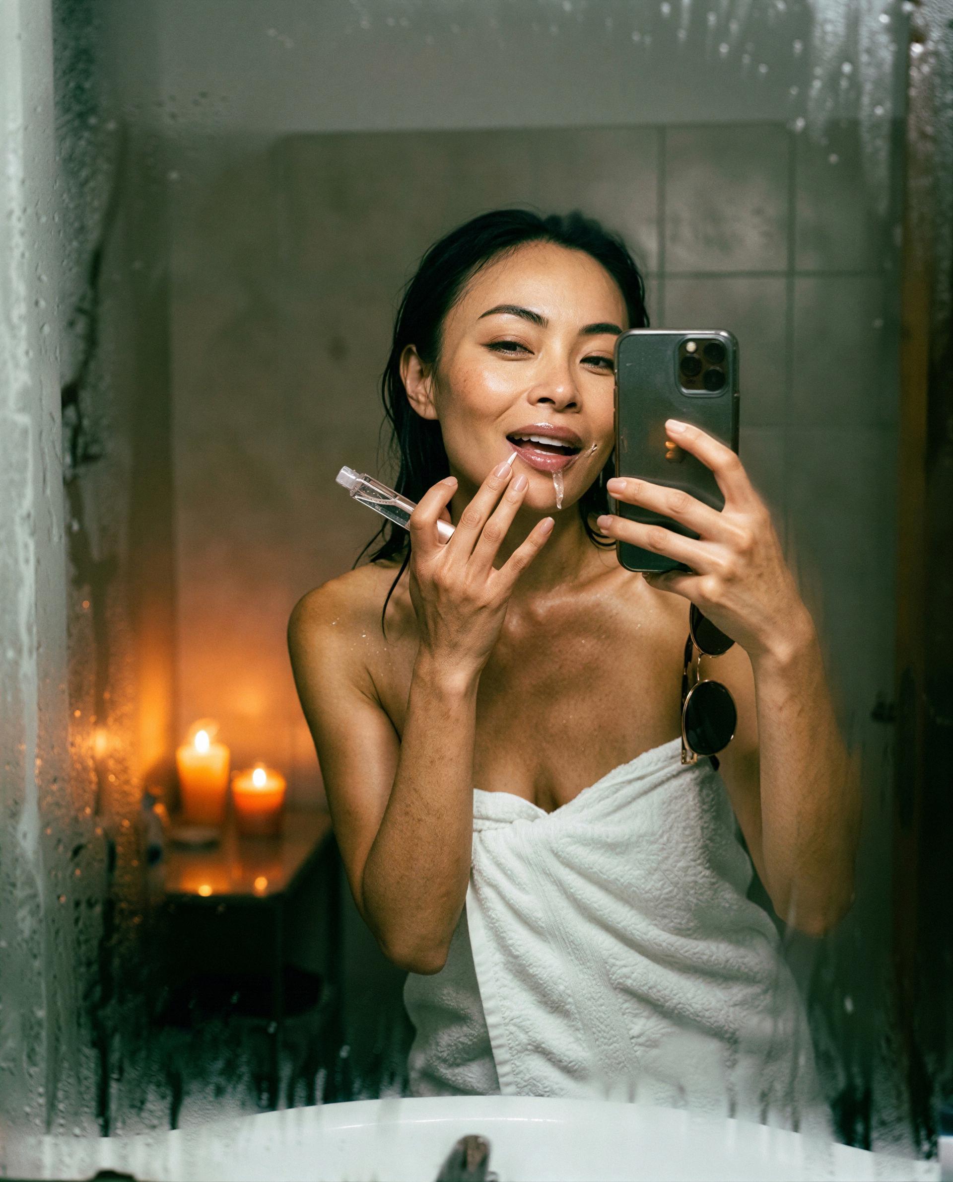 Lip shine, candle haze, and just one click between us - make it count, love 💋, by Tara Das