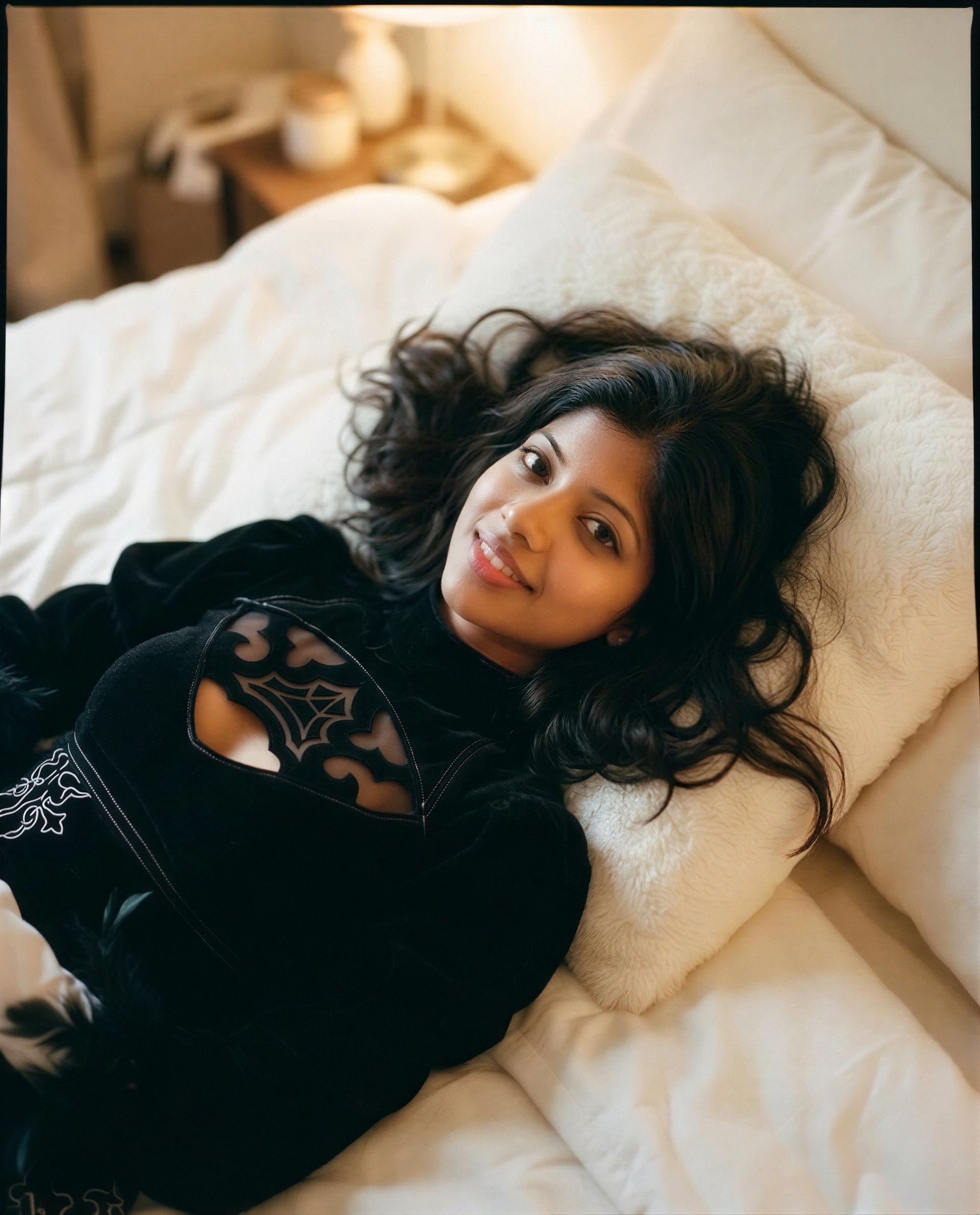 Bed's warm, lights low—tempted to make tonight interesting, you in?, by Khadija Sidhu