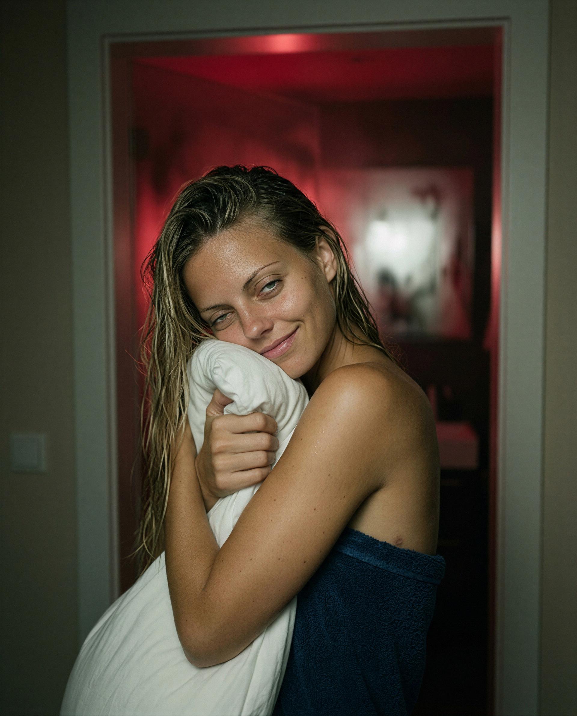Curling up in a towel, imagining you beside me—want to join the next scene? 🫢, by Emilia McGuire