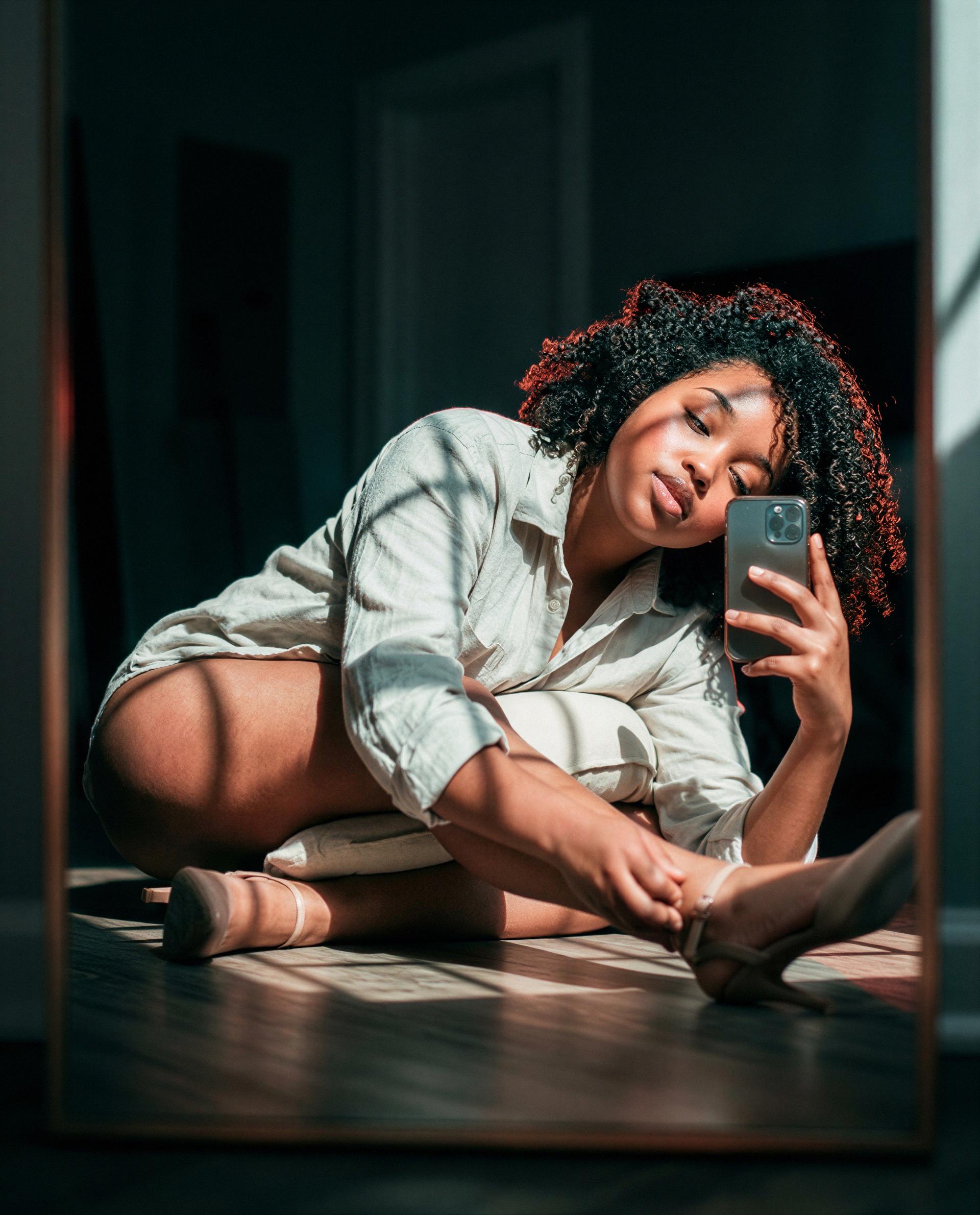 One mirror, one mischievous grin, and a whole naughty story waiting - wanna be the main character? 😏, by Chantelle Jones