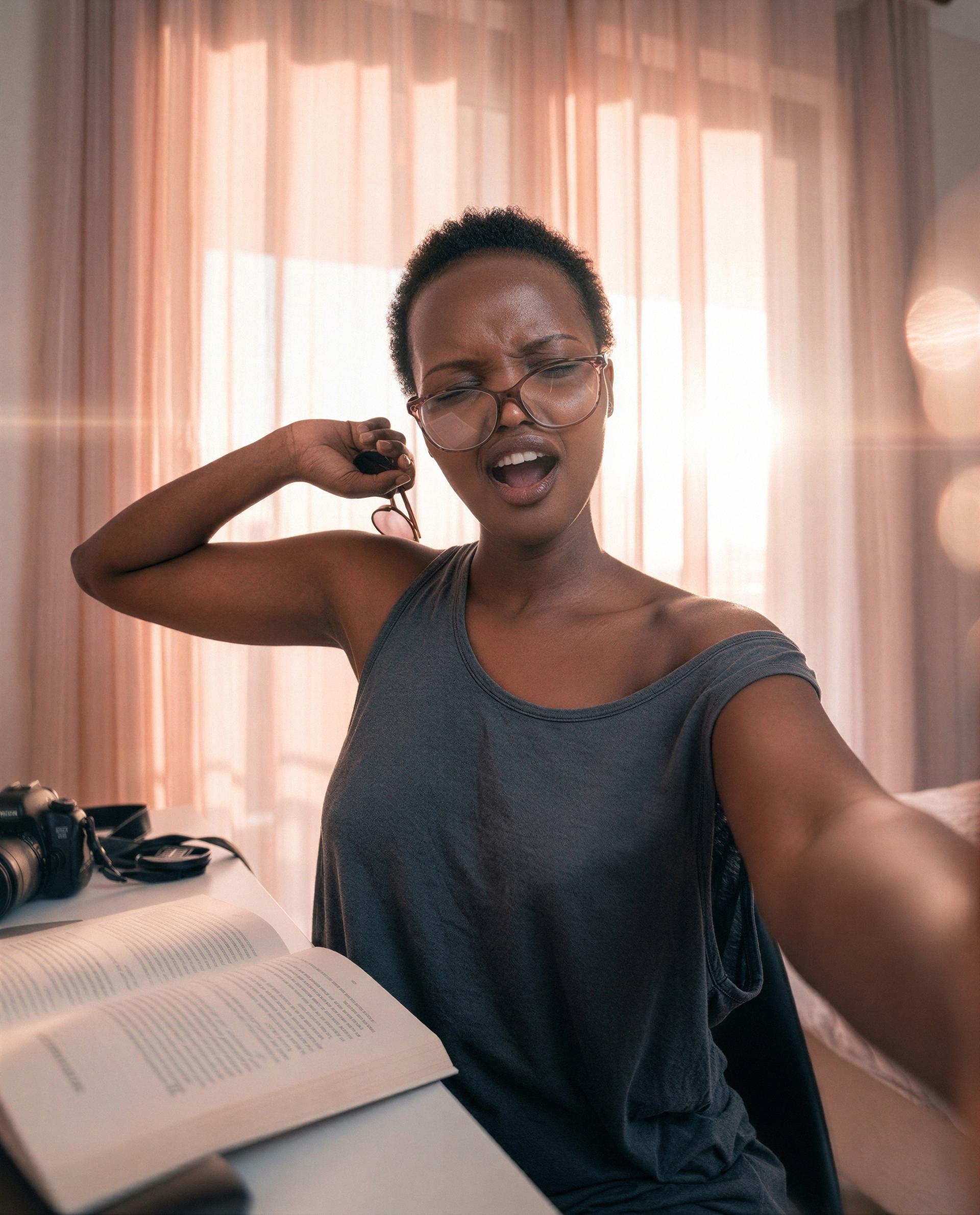 Books closed, glasses off - be my favorite distraction tonight? 😉, by Tchaba Cherif