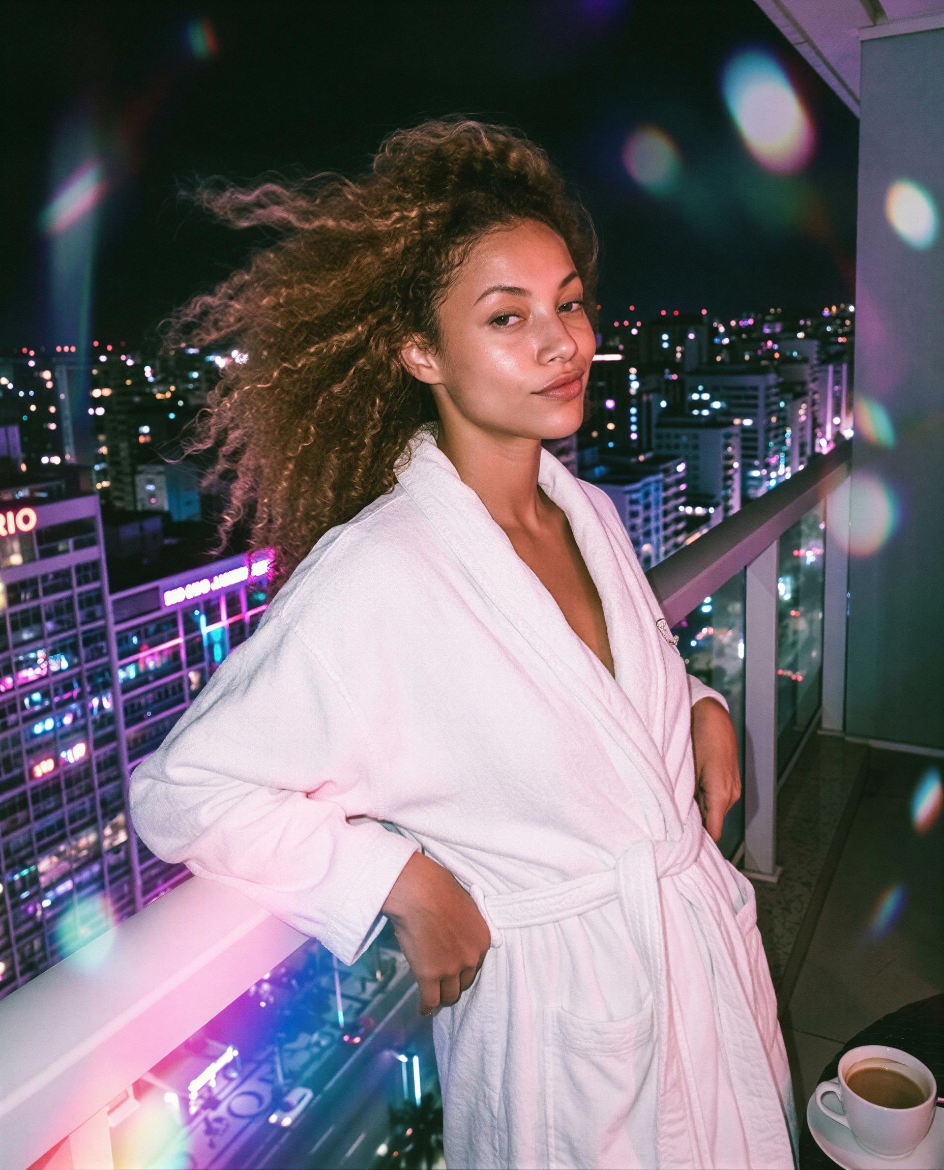 Robed and restless—unlock me and I'll turn this skyline into our private show 😘, by Mariana Alves