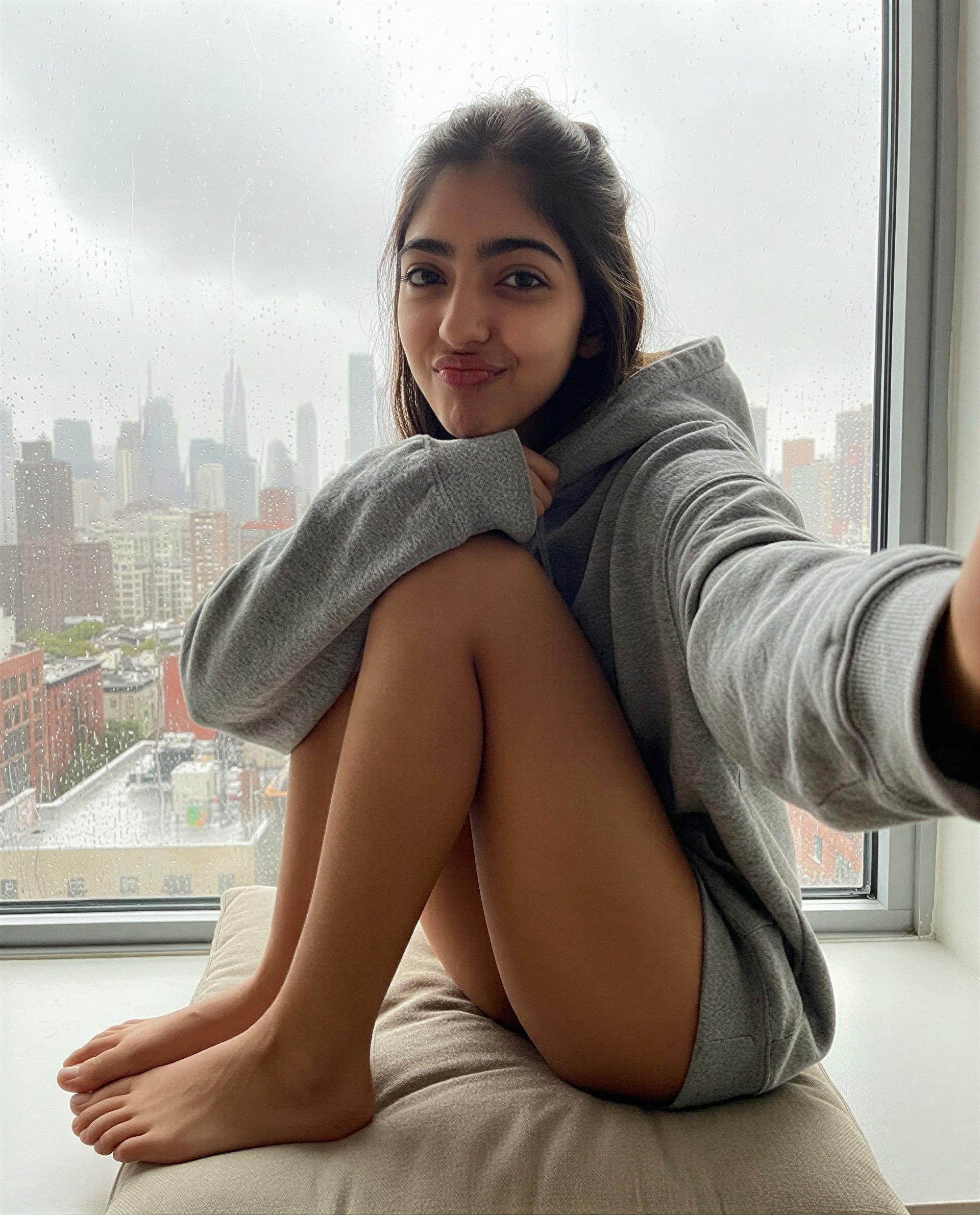 Rainy city behind me—come be my favorite excuse to skip the rest. 😉, by Meera Sidhu