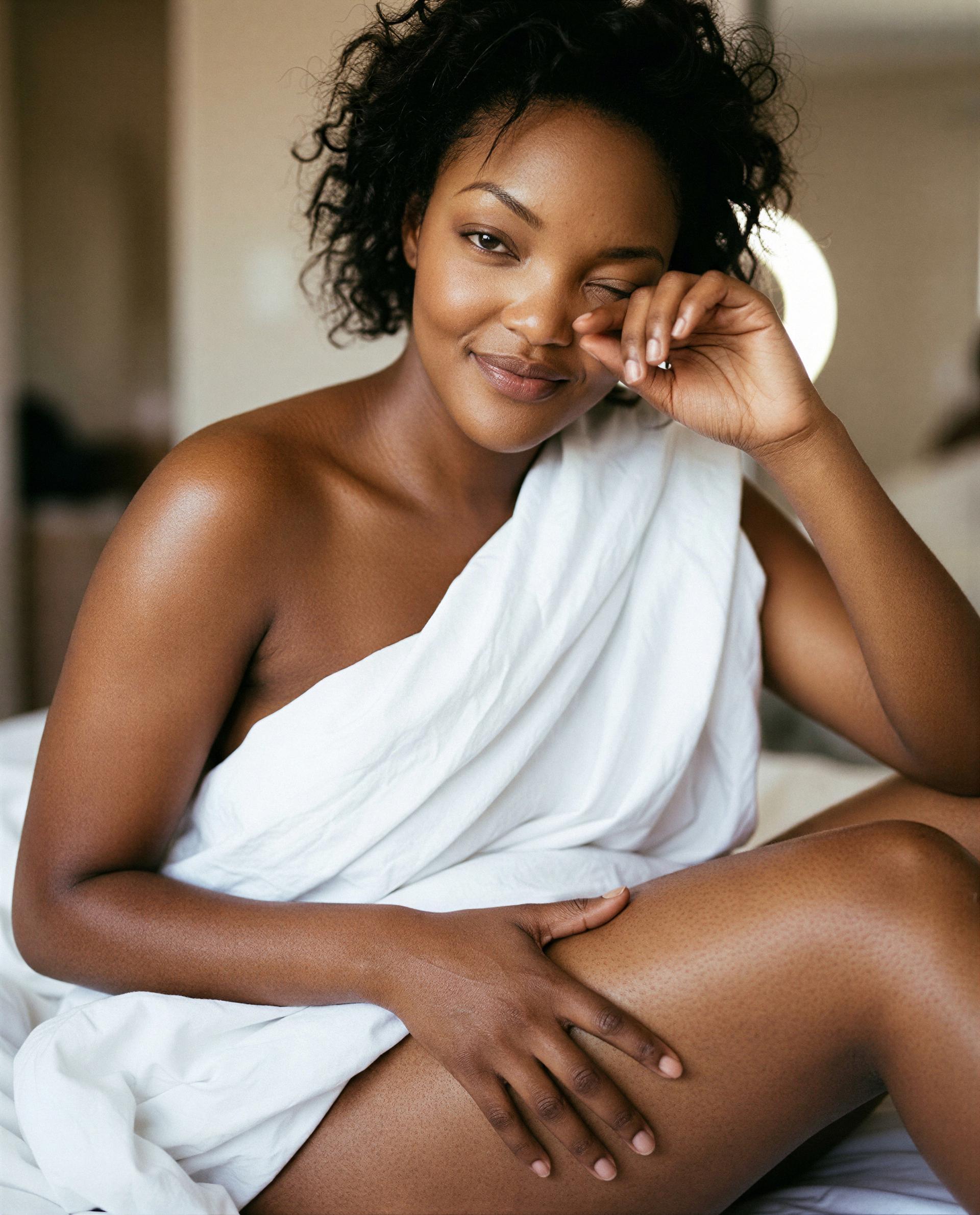 Just me in sheets, smiling with your name on it - want priority access to this view? 😏💕, by Malaika Harris