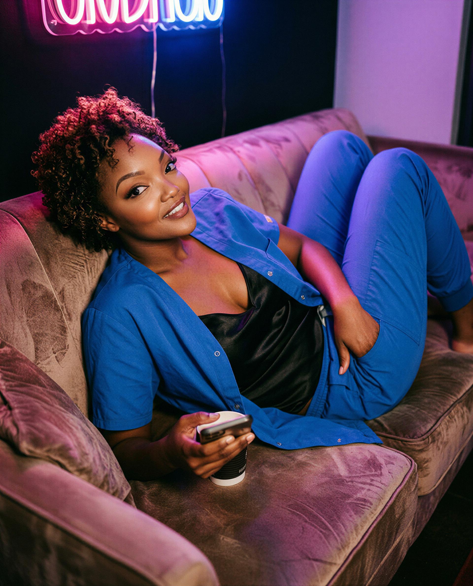 Scrubs off, mood on—want a private after‑hours show just for you? 😘, by Malaika Harris