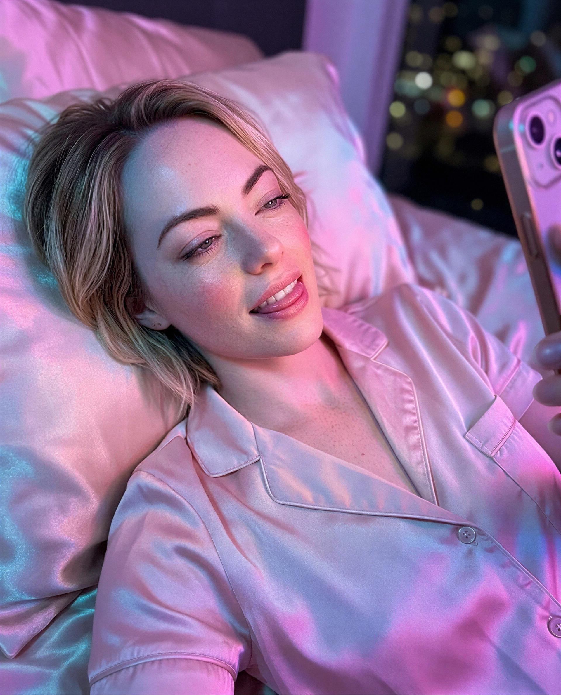 Lights are low, phone’s on—slide into my messages and let me make you stay 😘, by Erin Frank