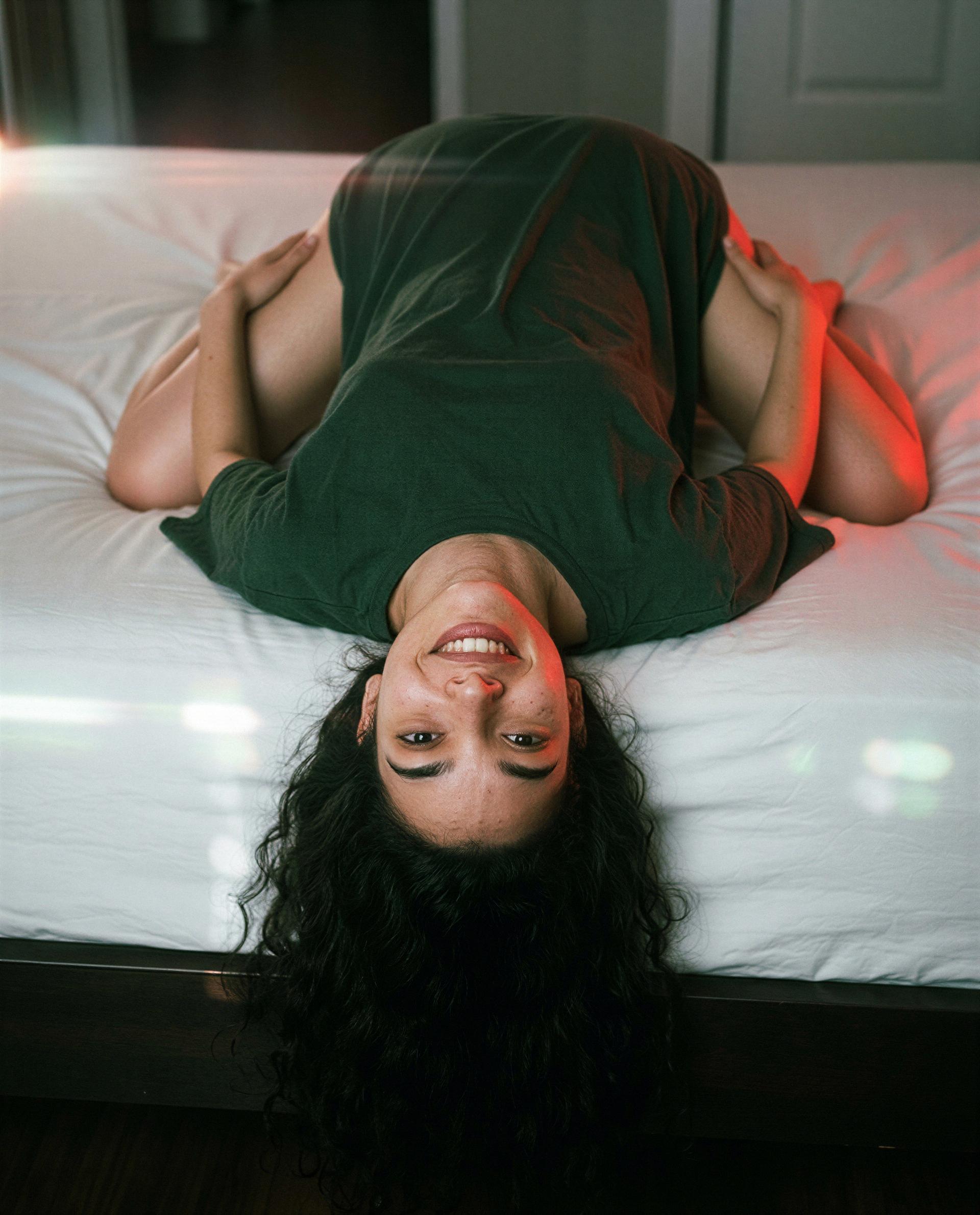 Head flipped, grin ready—unlock the rest and make me blush 😘, by Patricia Carvalho