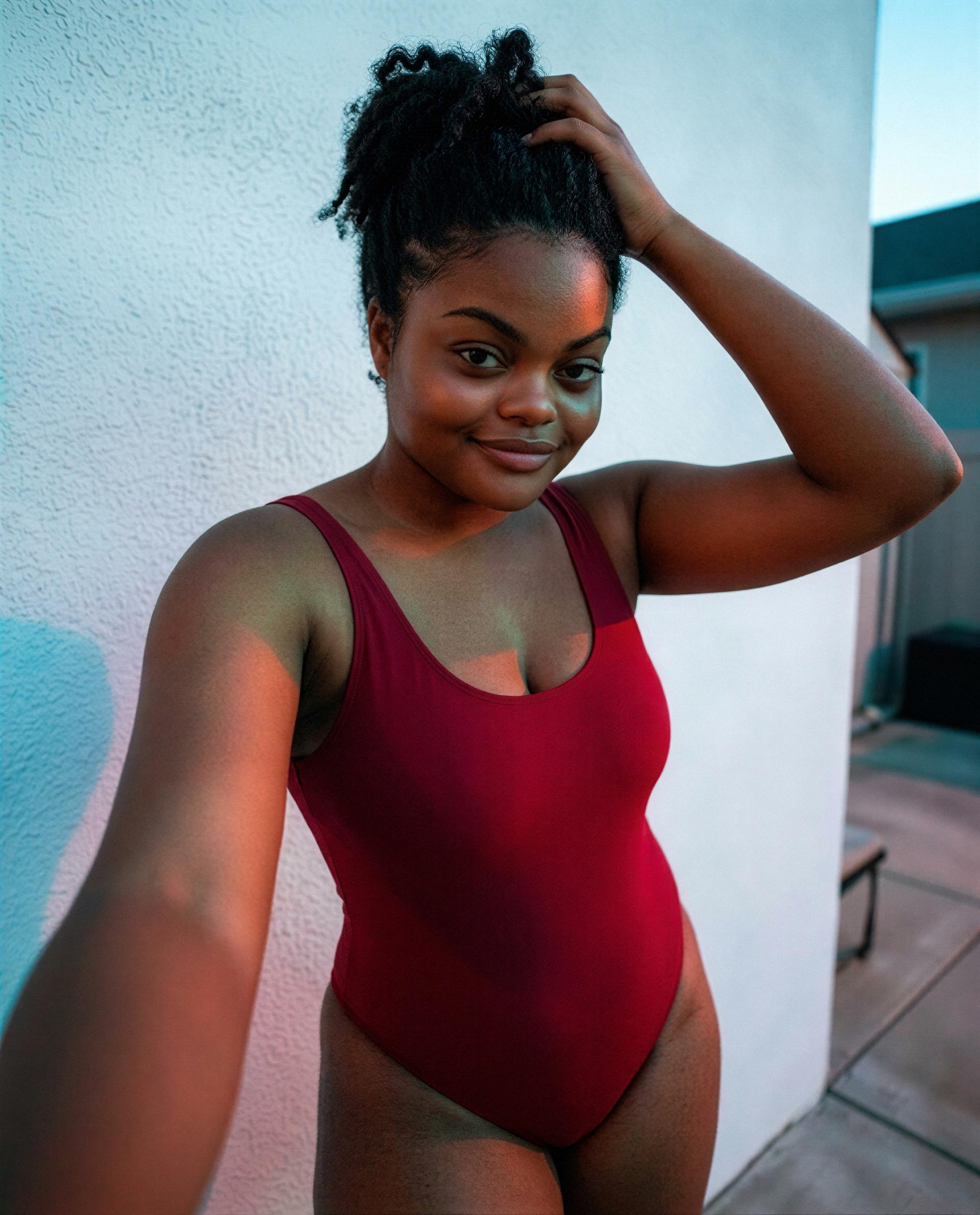 In red and thinking of one person—be my tonight-only guest? 😘, by Amina Sow