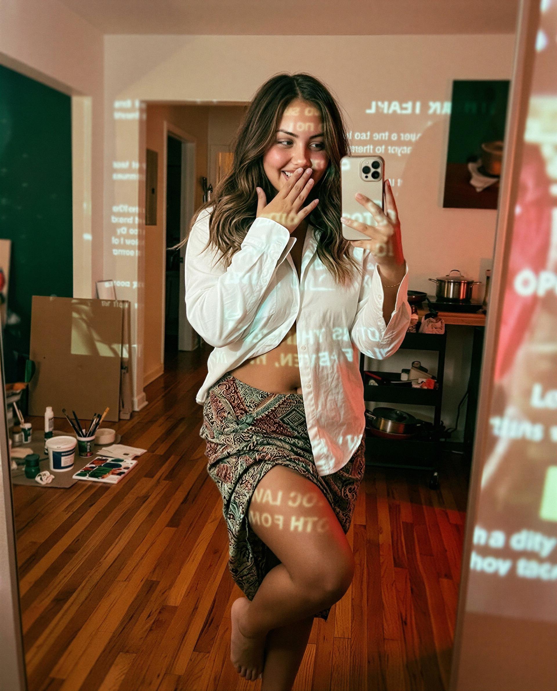 Mirror, phone, and a curve set aside just for your eyes 😘, by Estrella Castillo