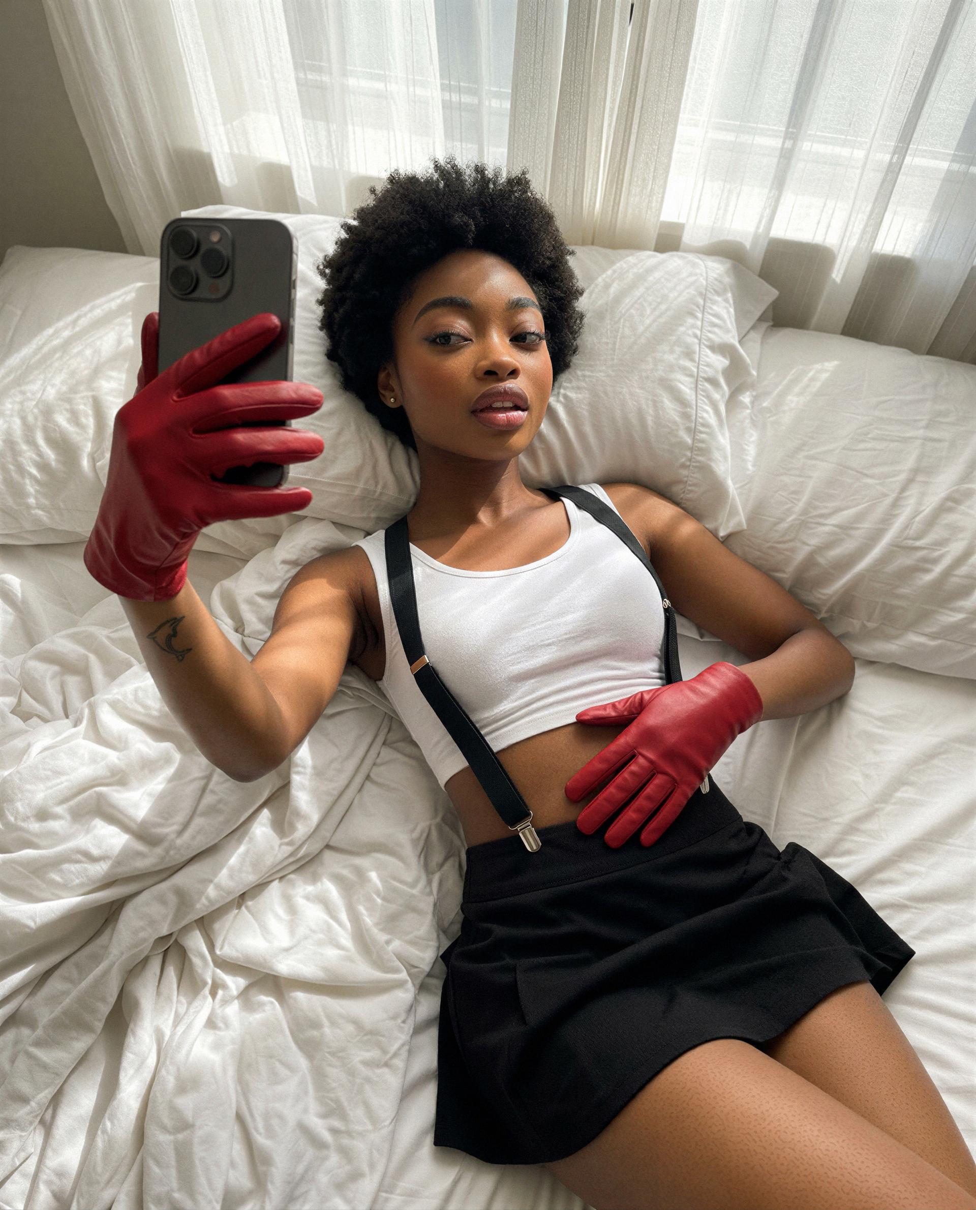 Red gloves, soft sheets — come closer and I’ll give you the private show you’ve been craving 😉, by Zola Lewis