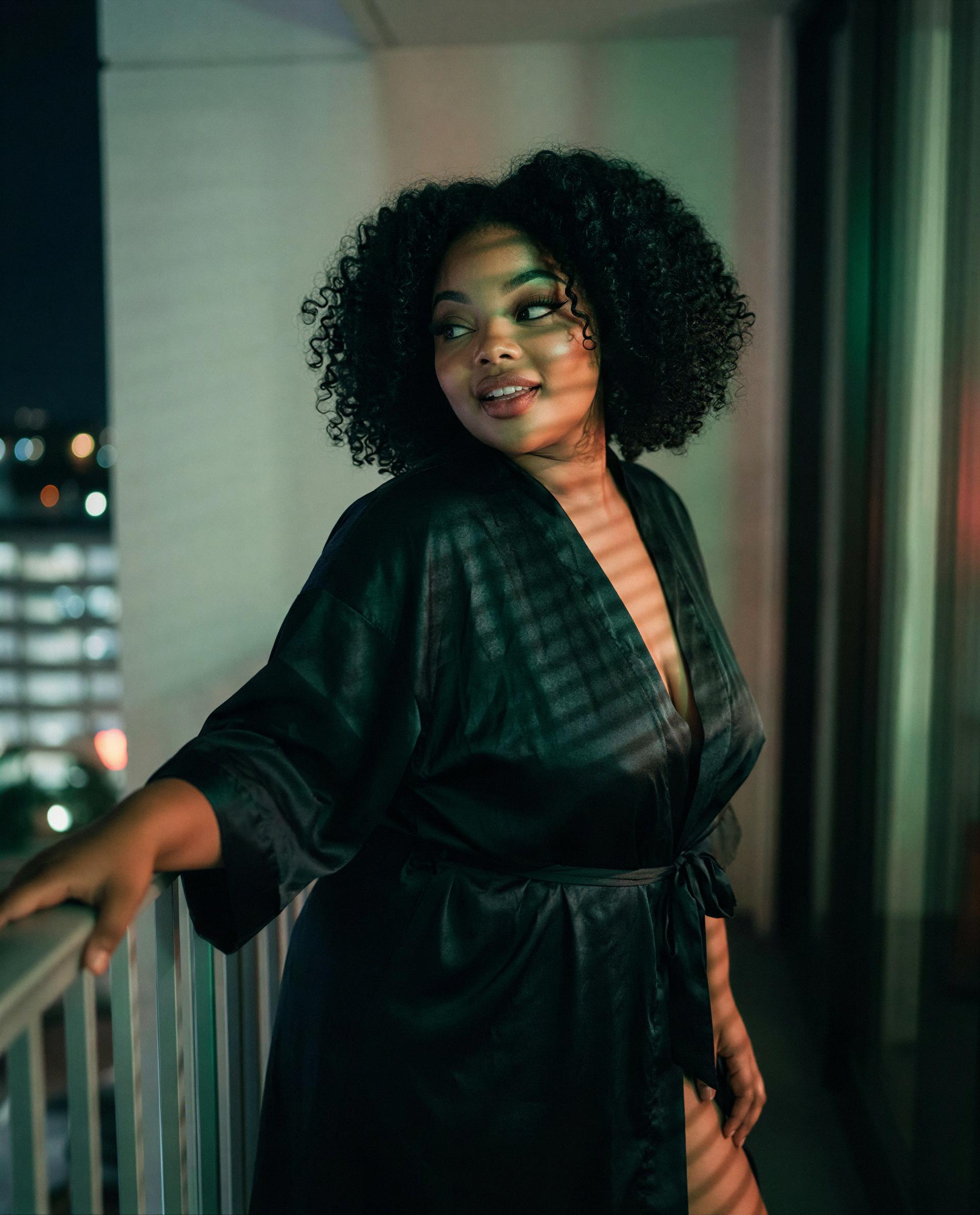 City lights, silk robe, and secrets I’ll whisper only to you—tempted? 💕, by Ayana Ade