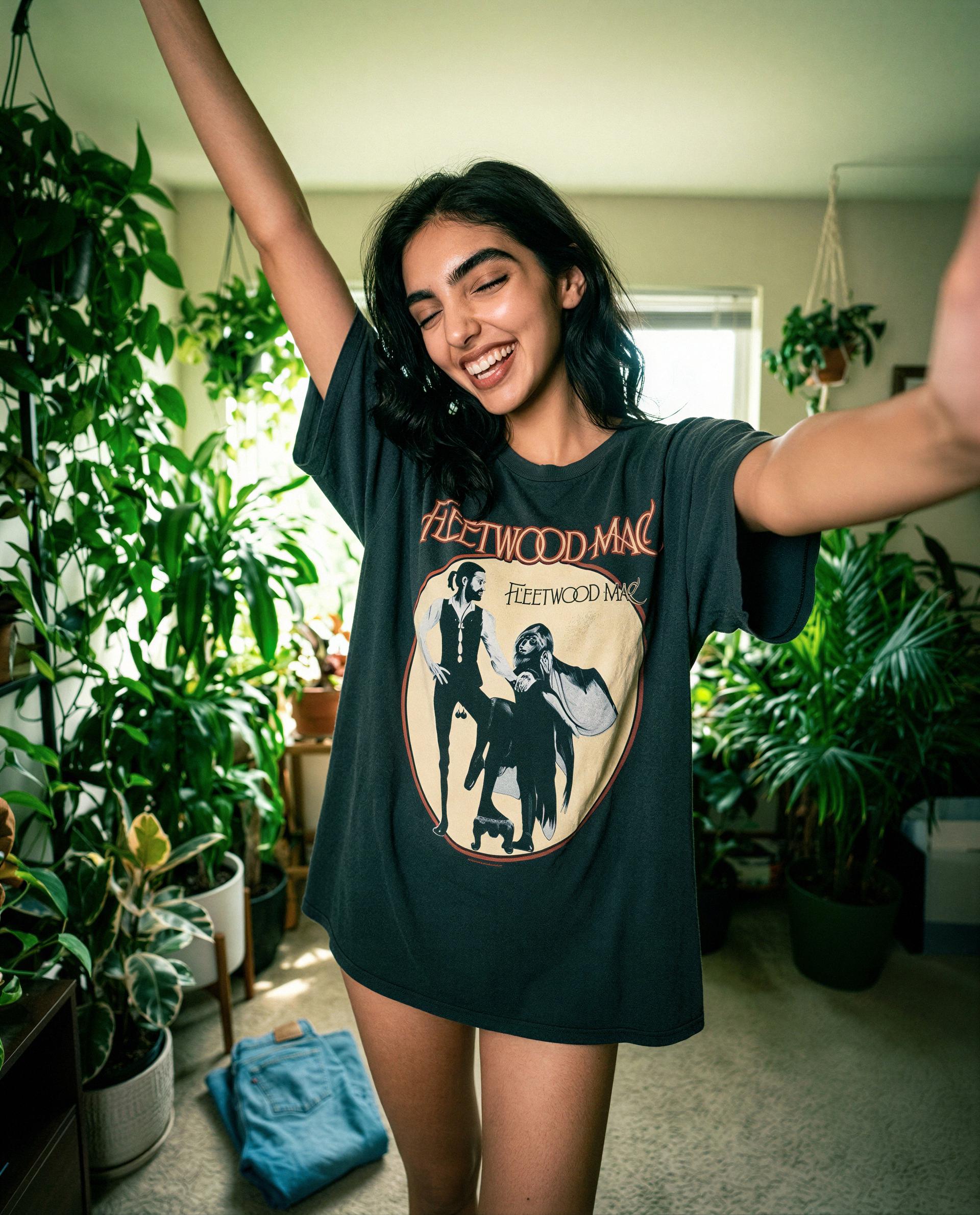 Fleetwood tee and a mischievous grin - think you can handle a private encore? 😉, by Ladan Jahan