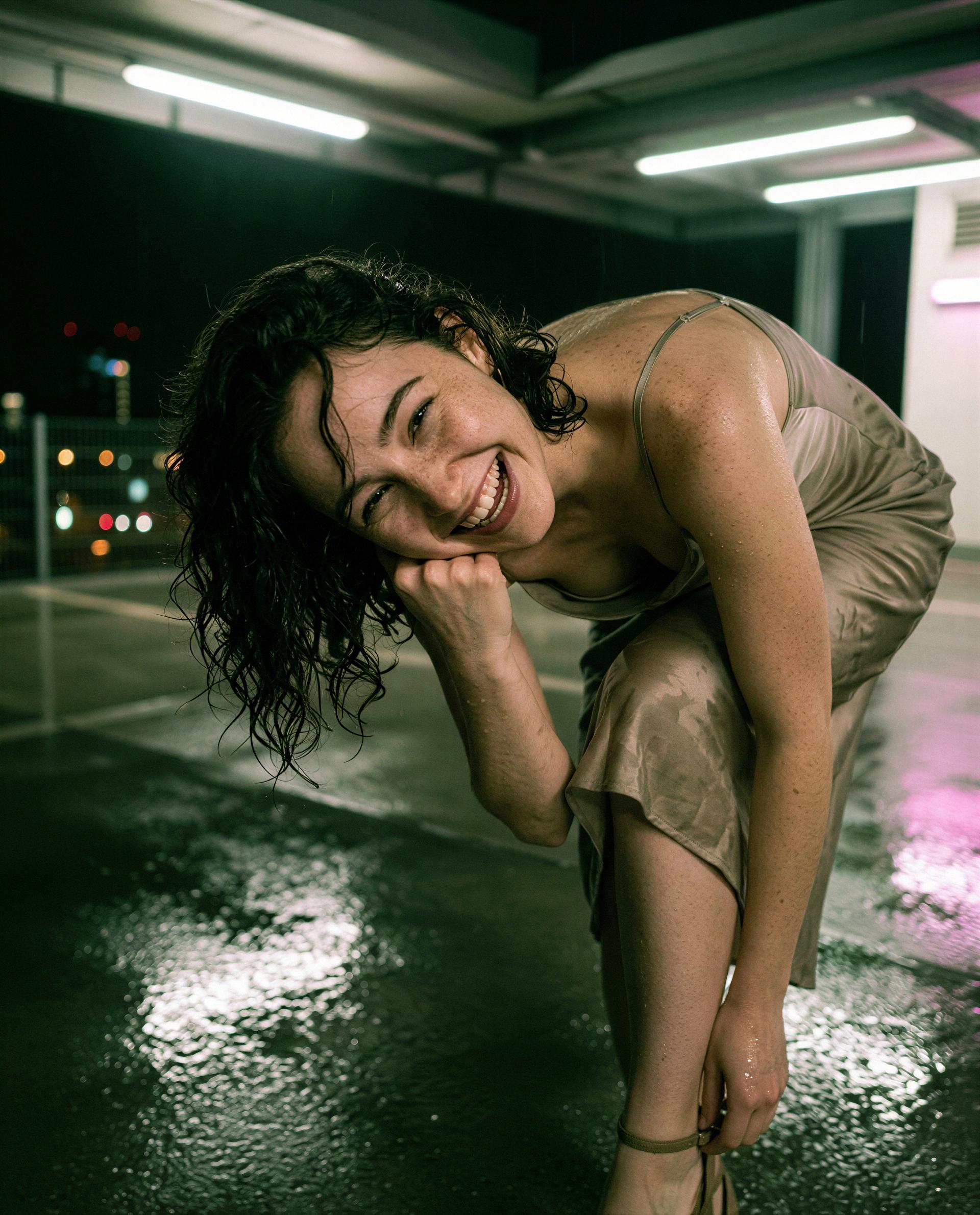 Drenched, daring, and smiling - drop a coin and I’ll give you a front-row seat to my favorite storm 😈, by Greta Krause