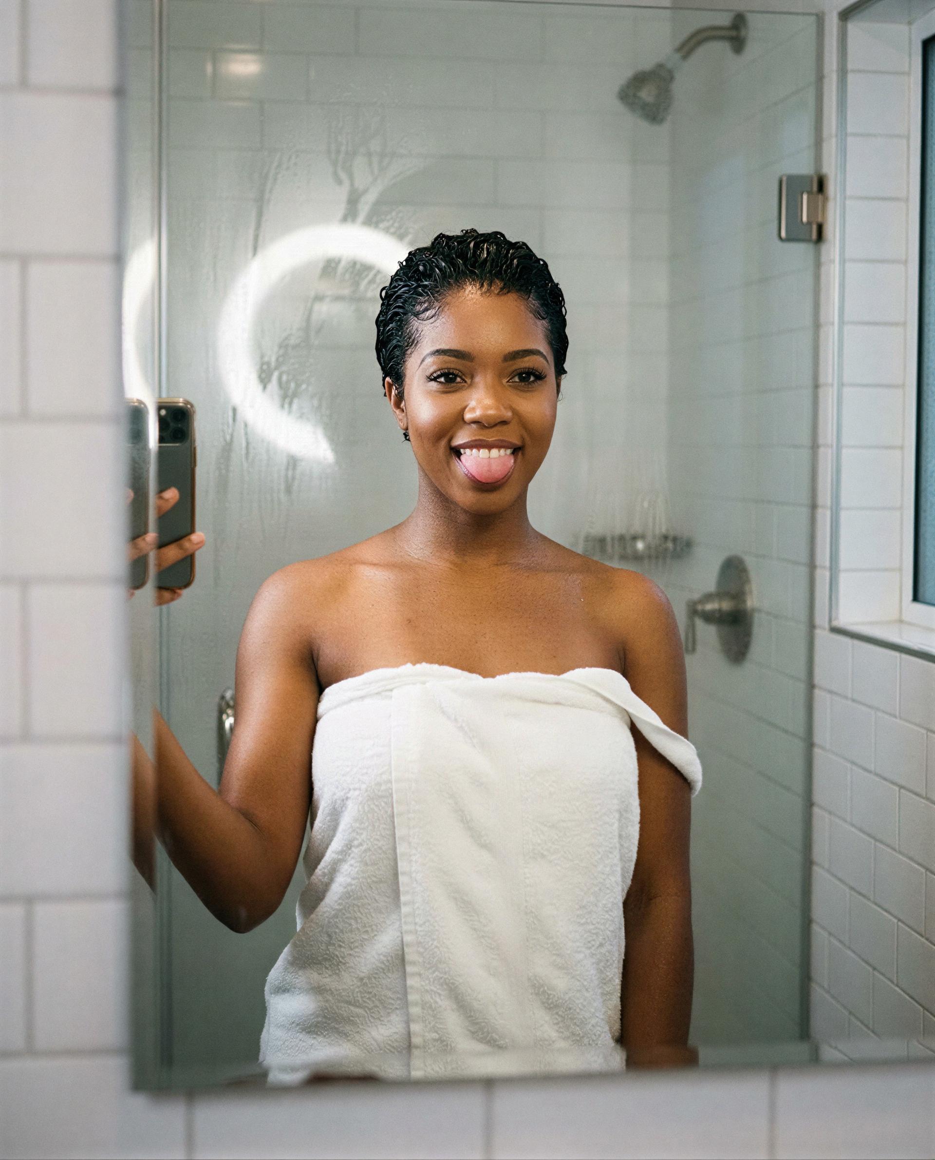Shower’s over, towel’s barely doing its job—who wants the private encore? 😏, by Ebony Wilson