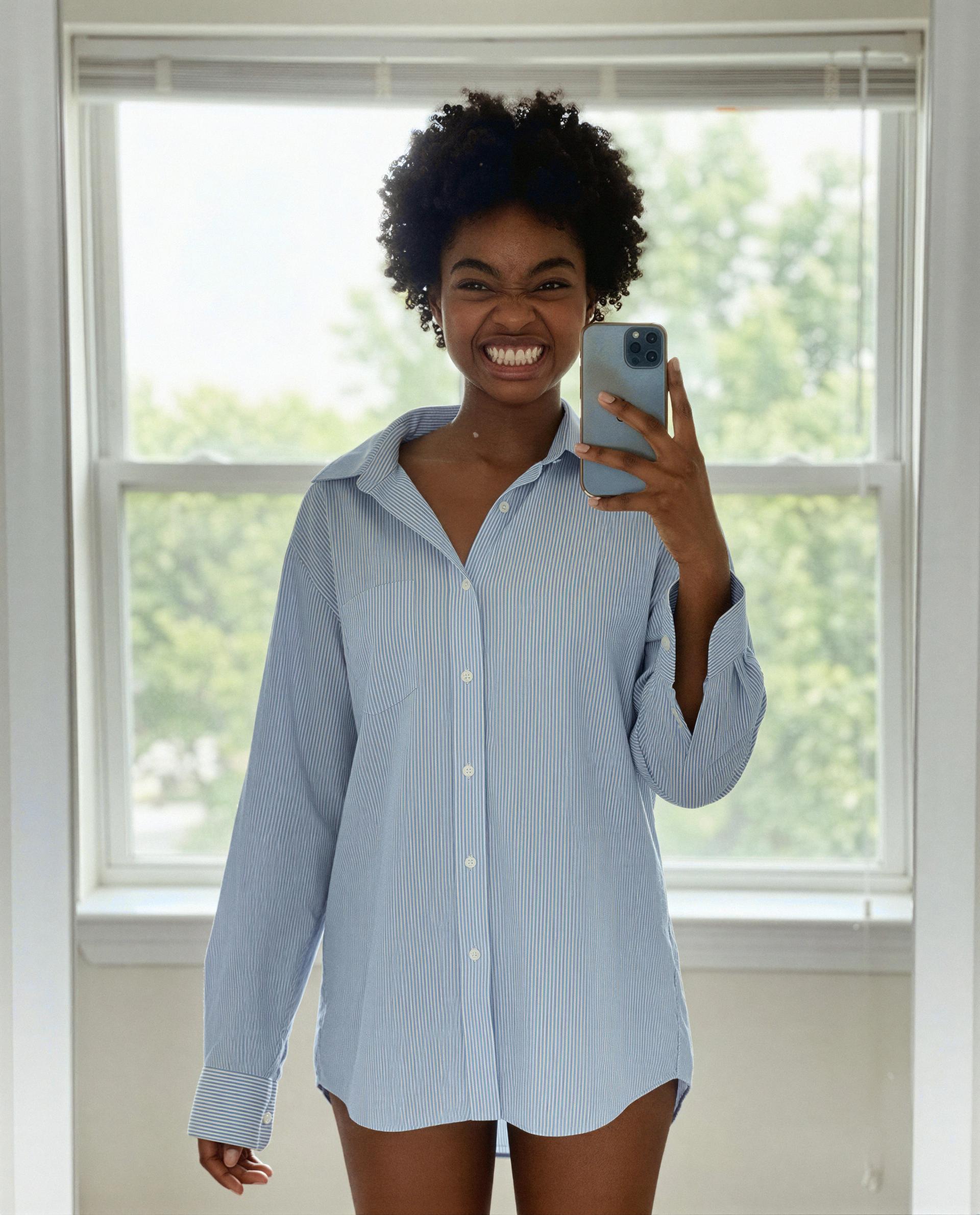This oversized shirt’s hiding all the fun—want help uncovering it? 😉💕, by Zola Lewis
