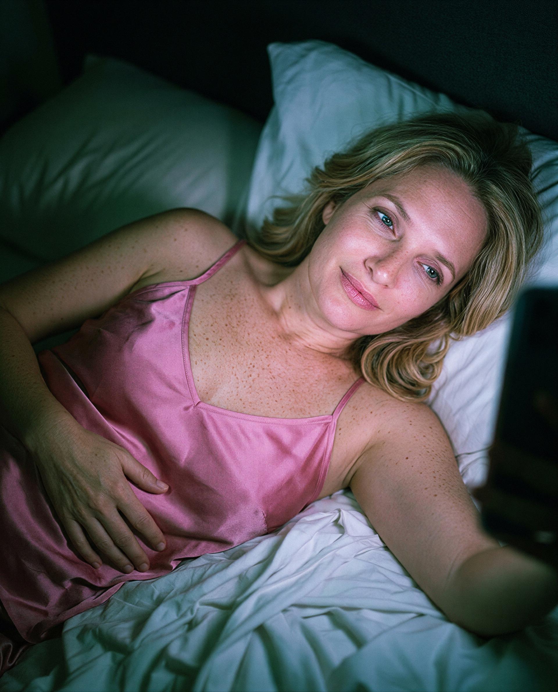 Silk, dim lights, and a phone waiting - dare to be the one who keeps me up? 😉, by Alessia Santi