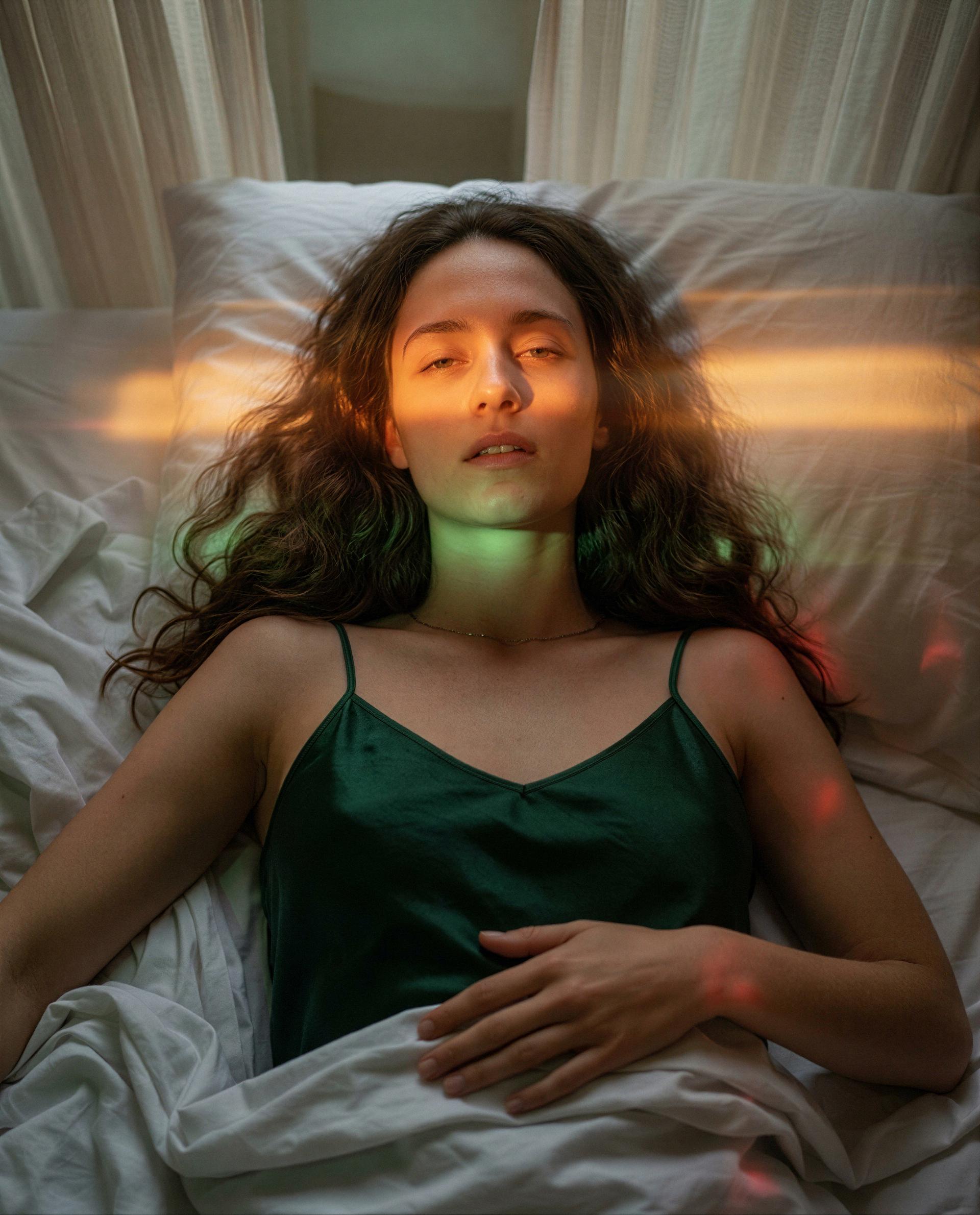 Soft sheets, warm light, and a very empty spot—think you can fix that? 💋, by Emily Schäfer