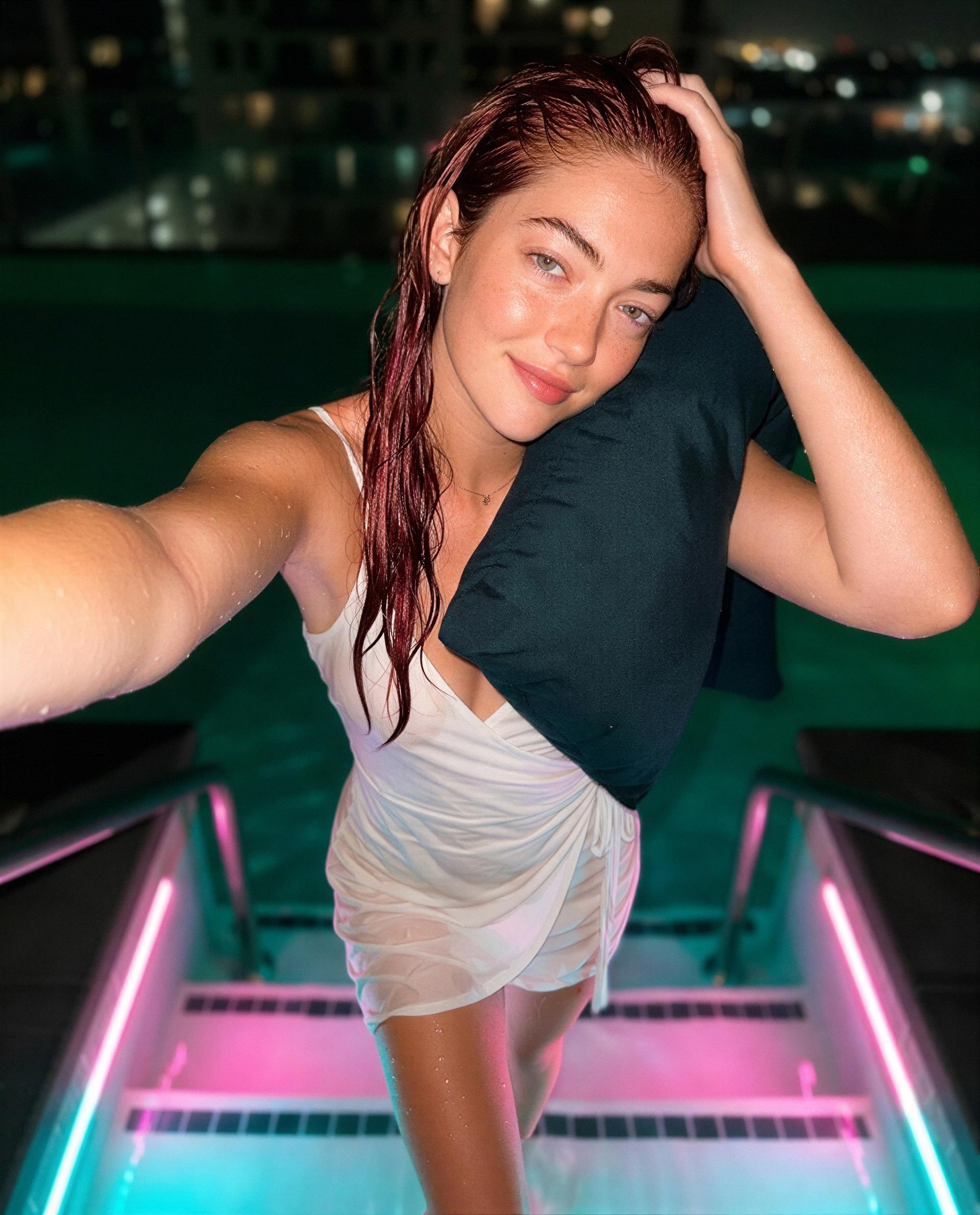 Pool lights, damp hair, and you on my mind—slide in and say hi 😉💕, by Hélène Davidson