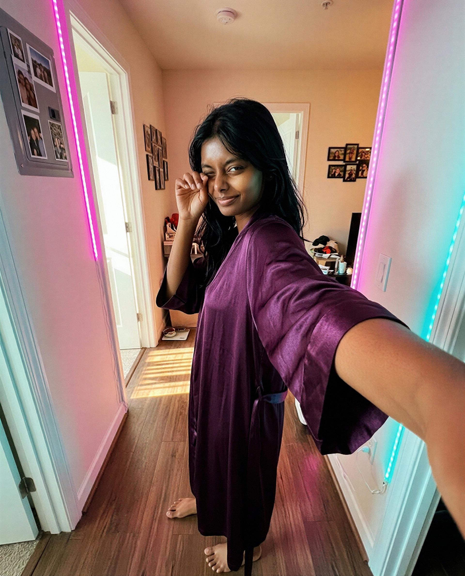 Wrapped in silk and a little trouble—dare to join me and find out why I’m smiling? 😉, by Esha Joshi