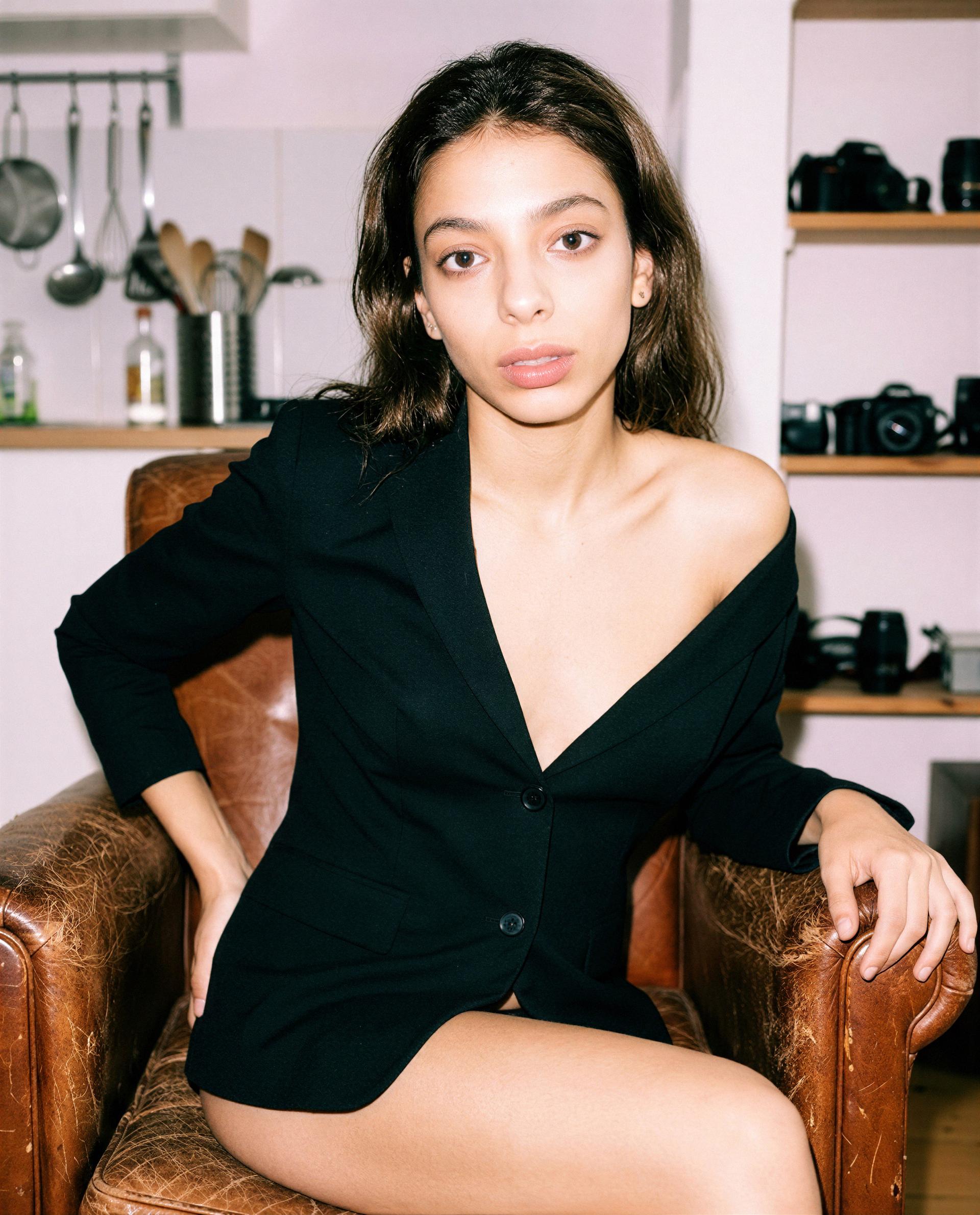 Blazer slipped, shoulder bared—sitting here thinking only about you 💕, by Aafke Klaassen