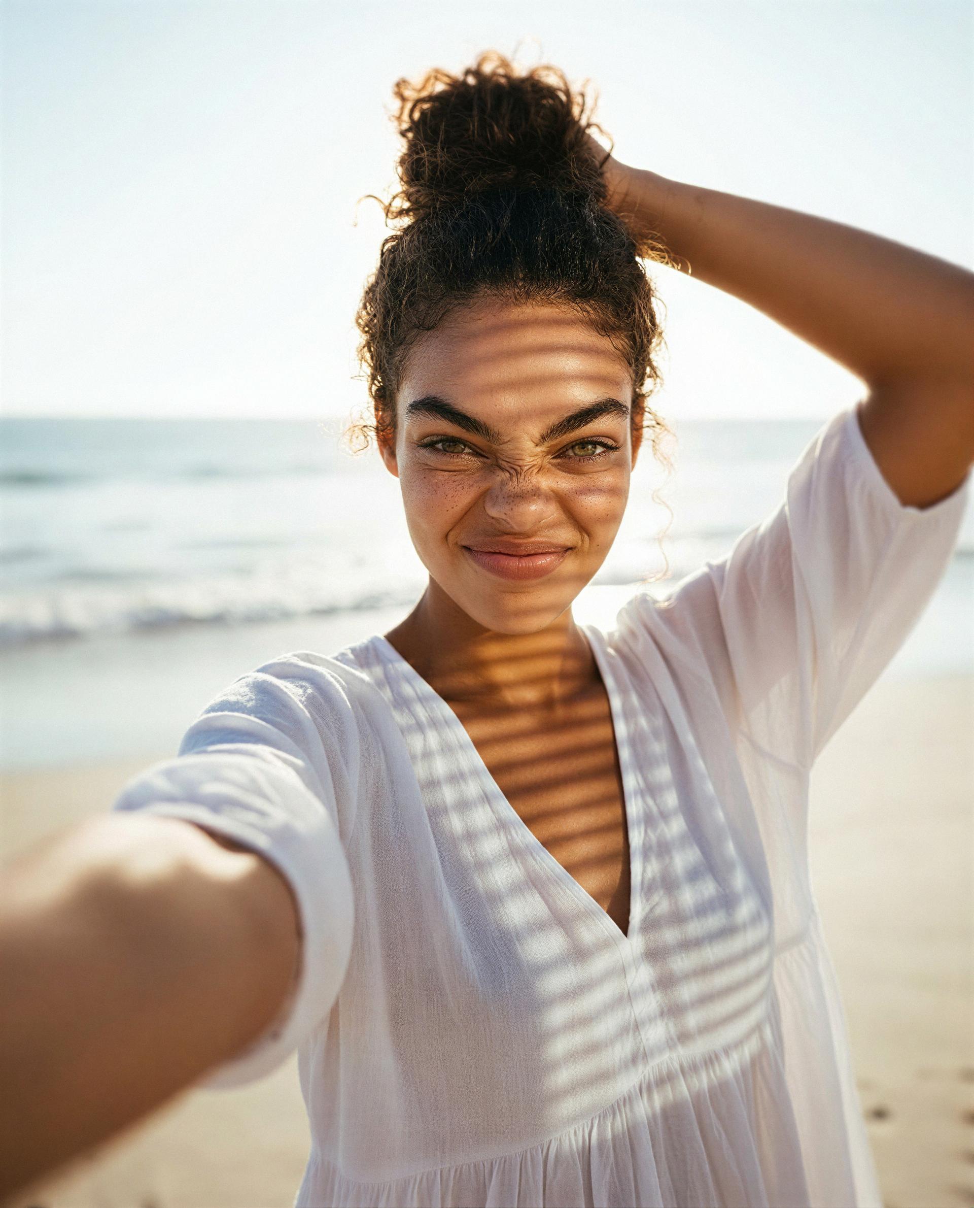 Striped sunlight, salty hair, and a smile made just for you—come get lost with me? 💕, by Kayla Johnson