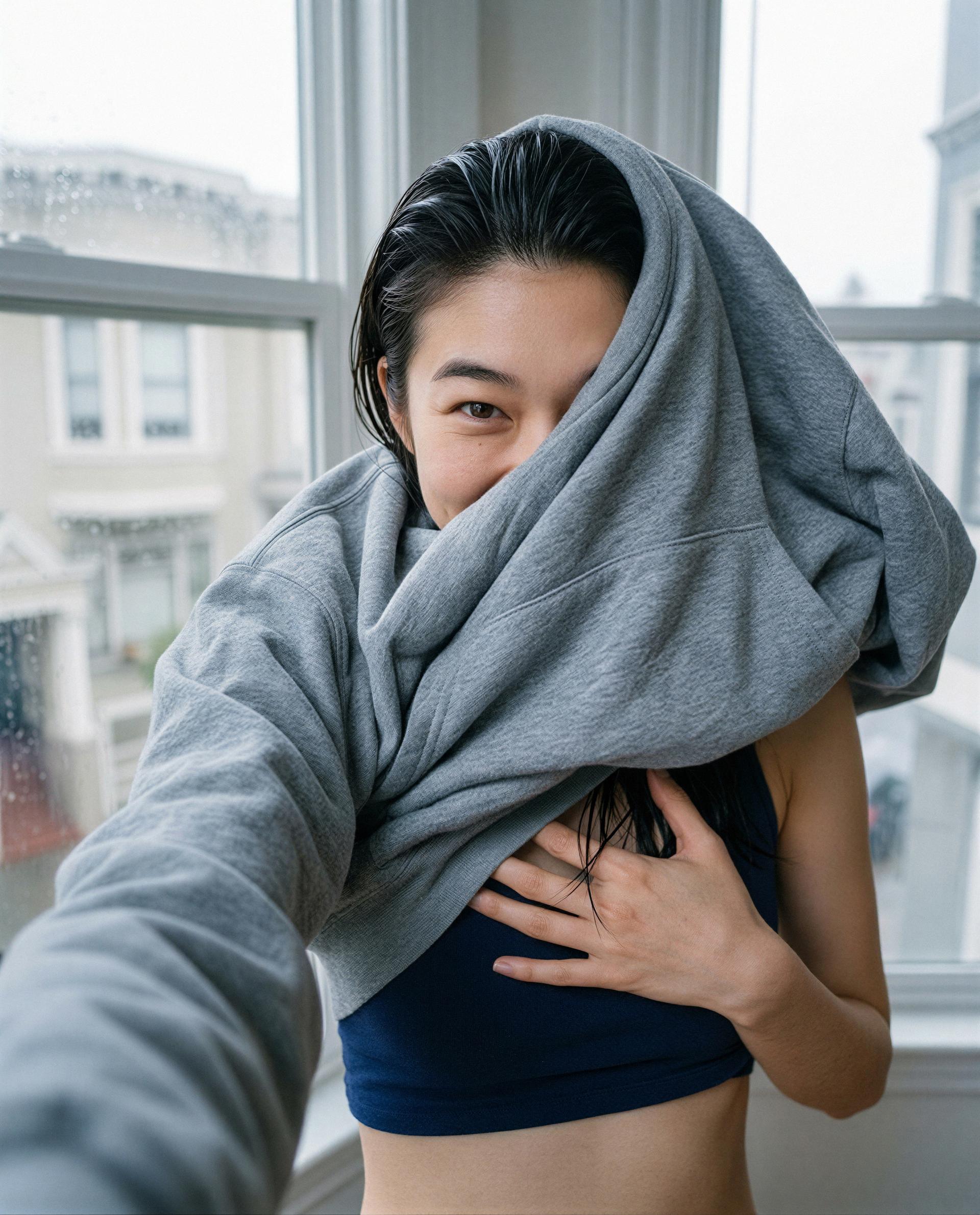Just me, a hoodie, and a secret you can earn—curious? 😏, by Chloe Nguyen