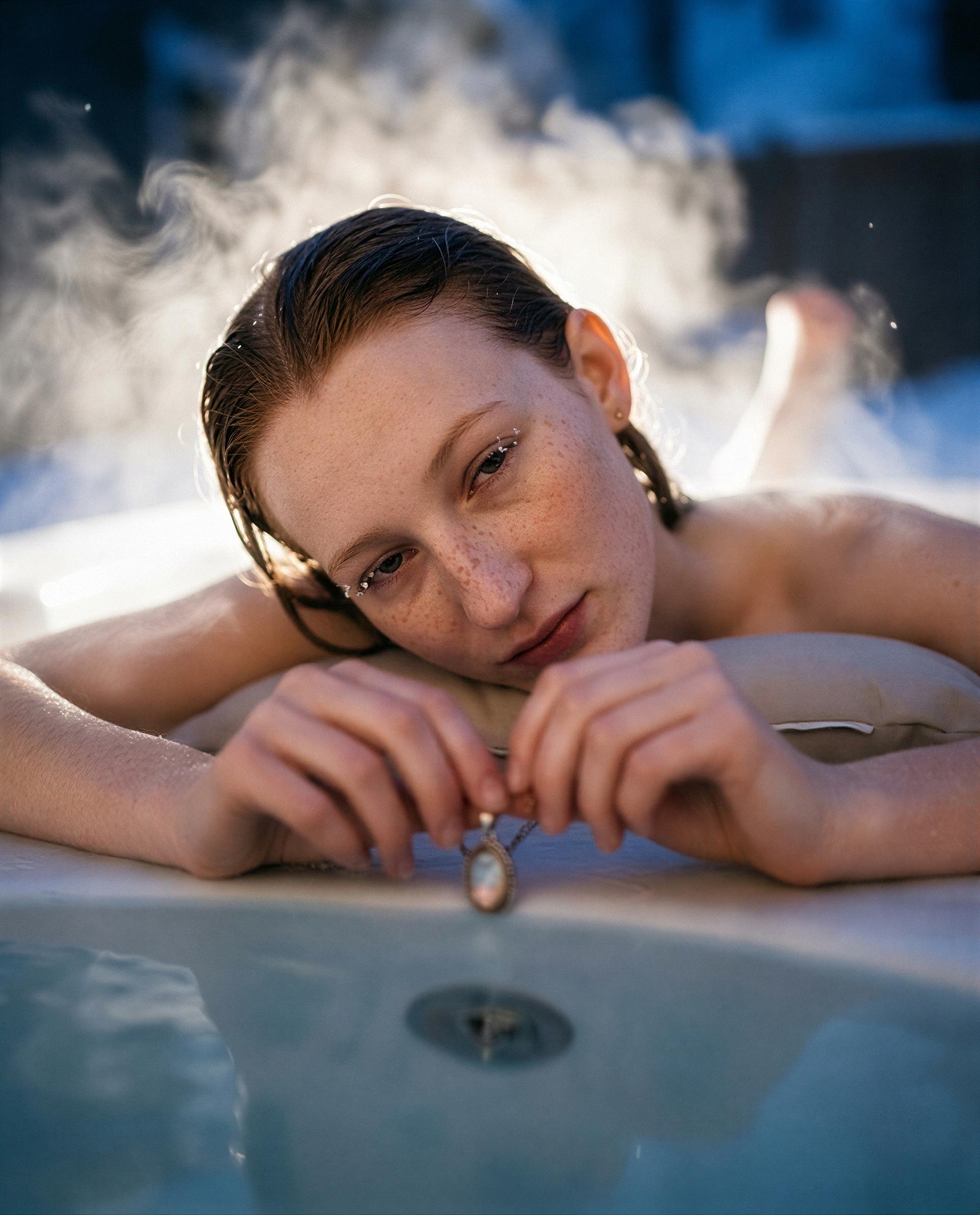 Steamy water, slow smiles—care to be the hand that reaches for this locket? 💕, by Lucia Schulz