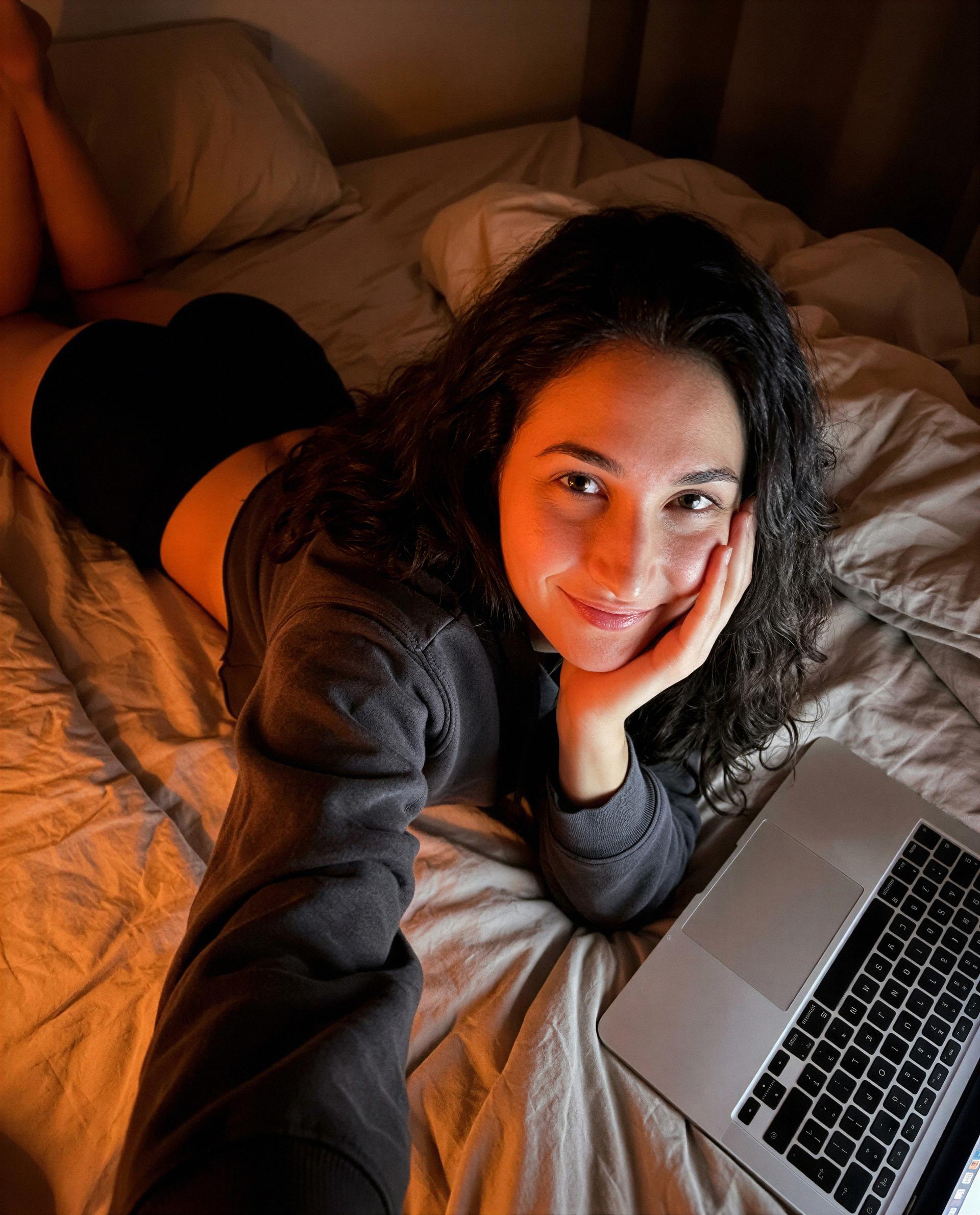 Laptop's warm, my bed's warmer—wanna help me find out which one wins? 😉, by Agata Adamski