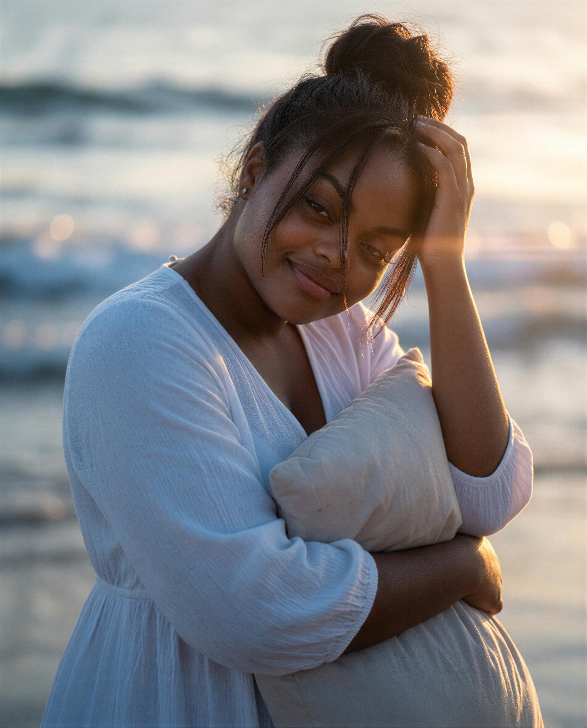 Soft pillow, warm waves, and a little secret—think you can handle being mine? 😘, by Amina Sow