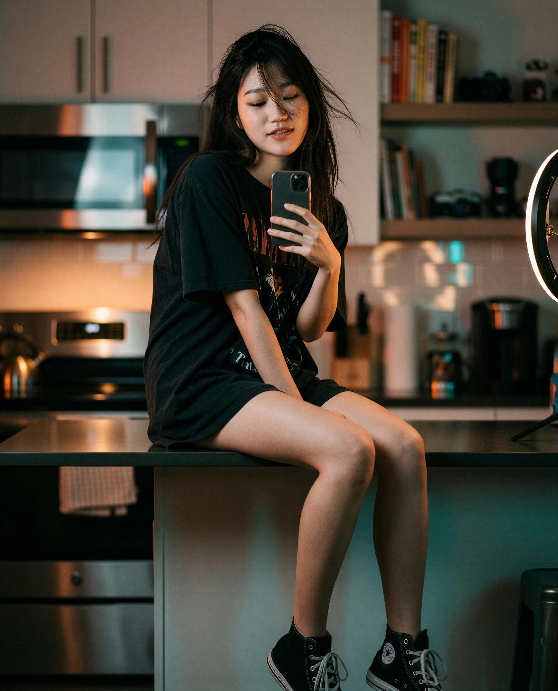 Perched on the counter, my tee’s doing all the flirting - ready to risk an encore? 😉, by Mai Choi