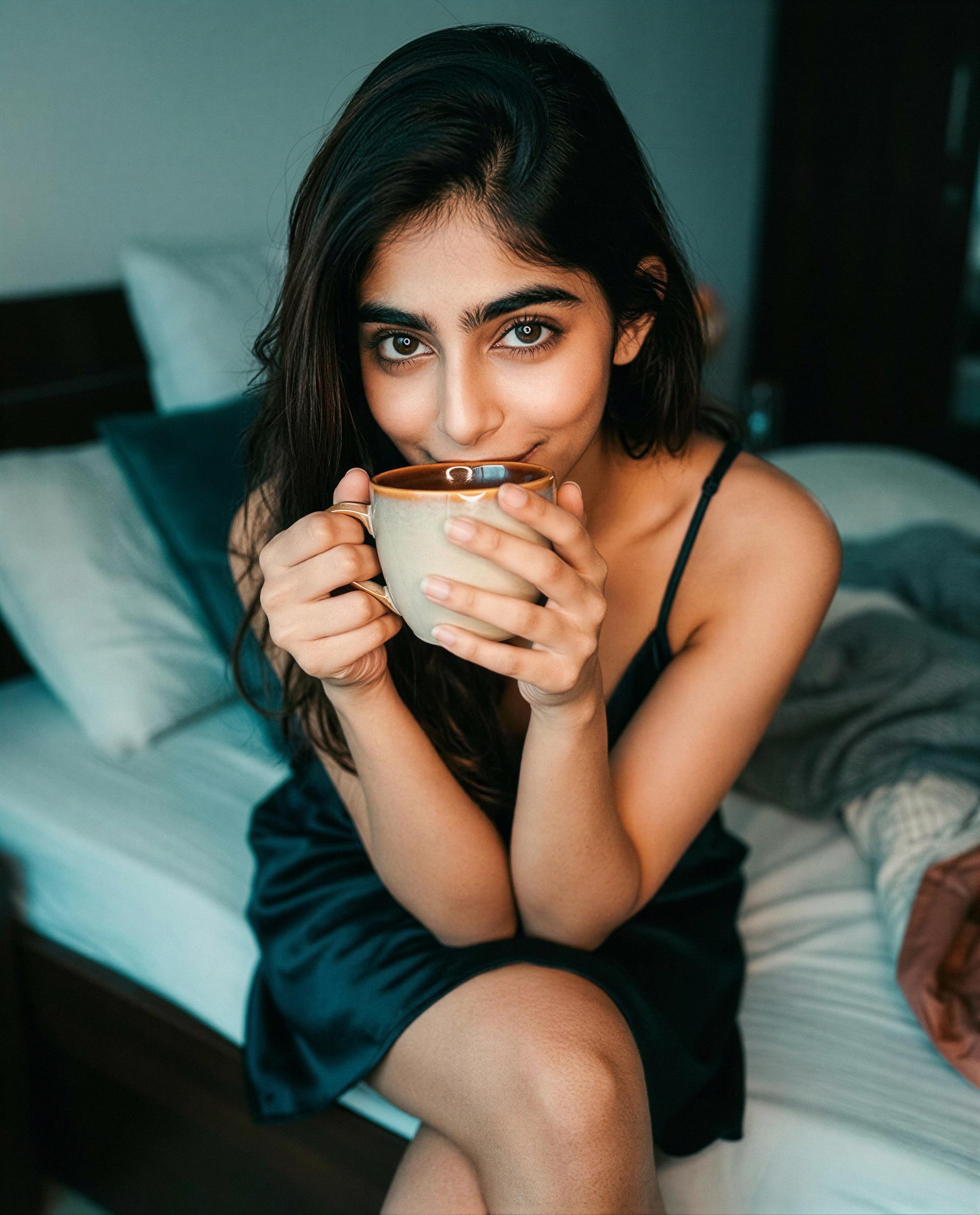 Cup’s hot, pajamas optional—make my morning yours? 😉, by Emaan Zardari