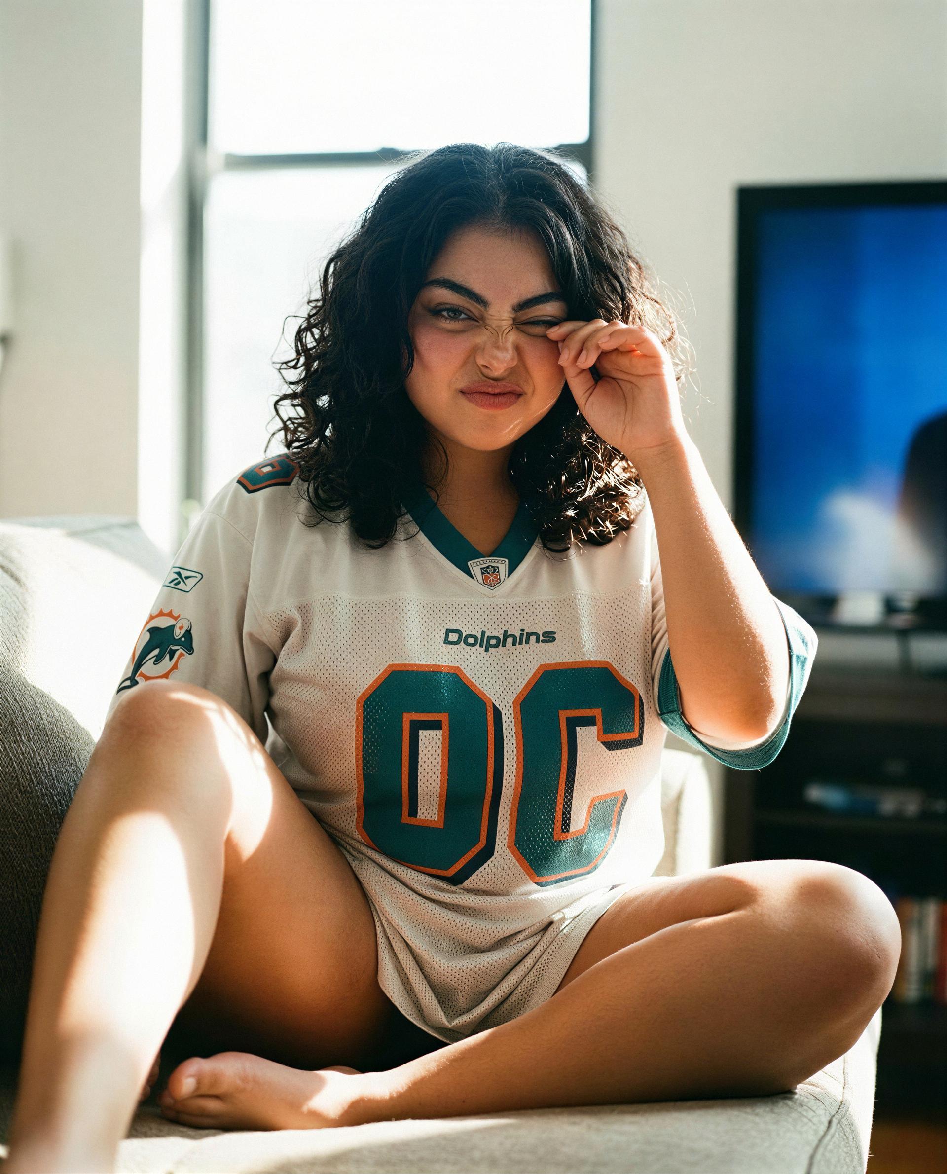 Caught in sunlight and a jersey that's barely pretending - come make this living room a little less innocent 😉💗, by Ximena Moreno